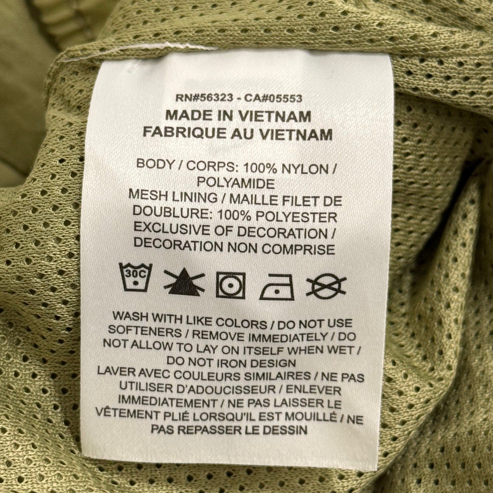 Nike fitted joggers pants for boy in olive green size L